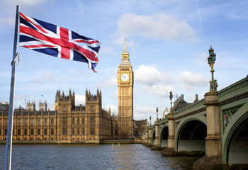 Fototapeta na wymiar London Big Ben and Westminster bridge and british flag