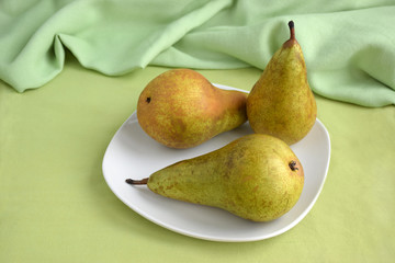 Three pears on the plate