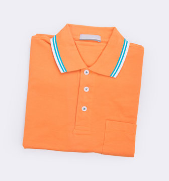 shirt or mens folded polo shirt on background.