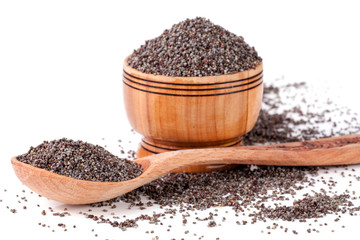 poppy seeds in a wooden bowl and spoon isolated on white background