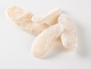 preserved fruits or dry ginger on the background.