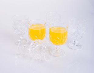 Orange juice in glasses on white background.