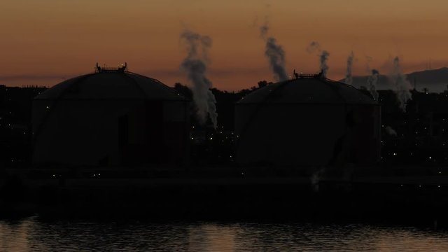 Silhouette of petrochemical plant in dusk