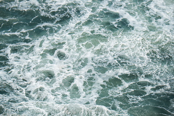Fototapeta na wymiar Marine background of water waves of Atlantic ocean near Portugal