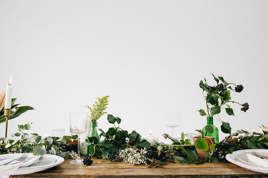 Greenery filled table setting
