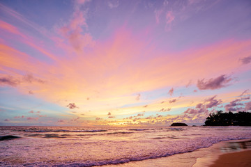 Naklejka na ściany i meble Beautiful landscape. Sunset on the sea shore.