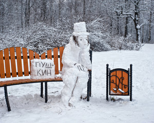 Alexander Pushkin famous poet is made from snow. (the text on the plate: PUSHKIN)