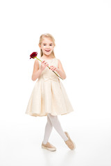 Girl holding red rose
