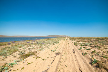 Road to red salt lake in Crimea, Russia