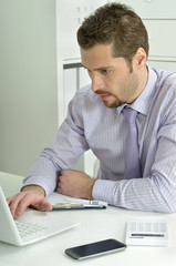 Fototapeta premium Businessman at the desk working 