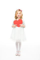 Girl holding paper heart
