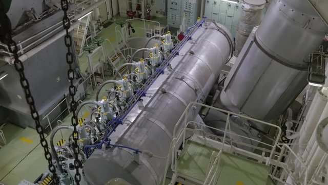 Main engine in engine room of ship