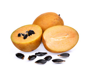 half of fresh sapodilla isolated on white background