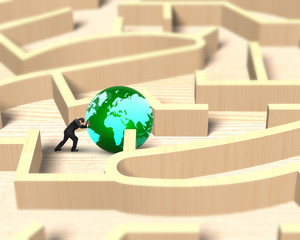 Man pushing globe in wooden maze game