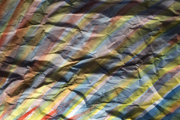 Background of colored crumpled paper shot close-up 