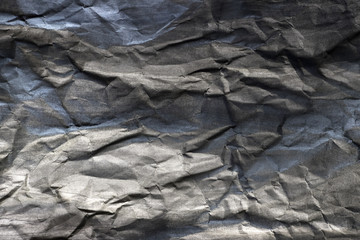 Background of colored crumpled paper shot close-up 