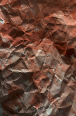 Background of colored crumpled paper shot close-up 
