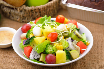 vegetable salad bowl on wooden background