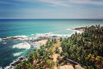 View  to ocean and palms from the lighthouse on the most south point of Sri lanka,