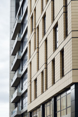 Modern architecture facade with balconies and windows