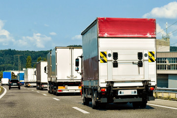 Trucks on roadway in canton Geneva Switzerland