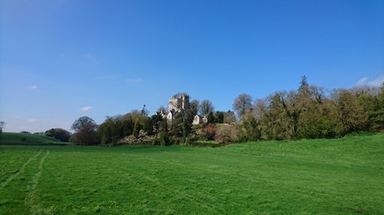 Green landscape Ireland blue skies