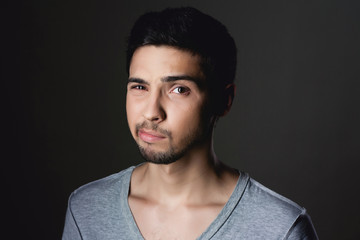 Fototapeta premium Portrait of a normal boy fun over grey background