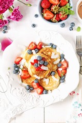Coconut pancakes with berries