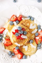 Coconut pancakes with berries