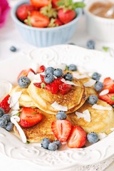 Coconut pancakes with berries
