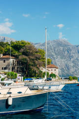 Fototapeta na wymiar Sailboat in the ancient town of Perast in Bay of Kotor, Montenegro