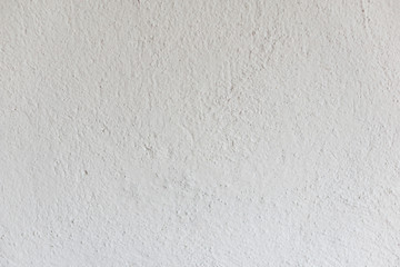 Closeup of an old wall plastered with lime in a rural home. Black and white texture, vintage, grunge, nostalgia.