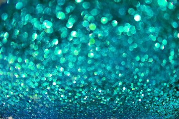 blue glitter blurred defocused texture. Christmas abstract sparkle background for party invitation and greeting cards.