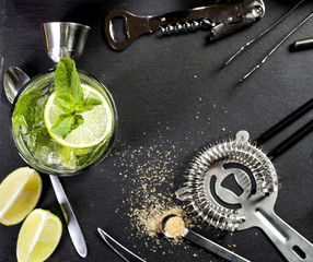 Mojito cocktail making. Ingredients and utensils.