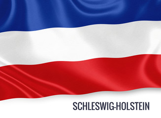 Flag of German state Schleswig-Holstein waving on an isolated white background.