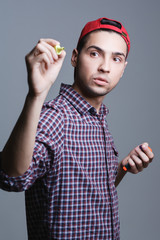 young man writes the text in the air, the topic of students and education