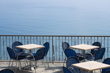 Sea view terrace with tables