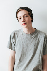 Vertical image of young man in hat
