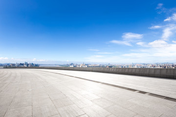 empty floor with modern cityscape and skyline