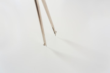 Drafting instrument on white macro