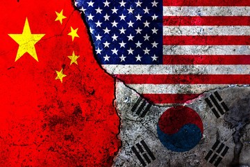 Cracks in the wall. Flags: USA, China, South Korea