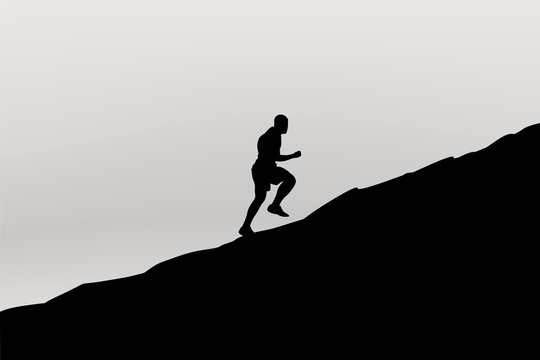 runner silhouette in mountain