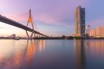 Bangkok Bhumibol bridge and city skyline.