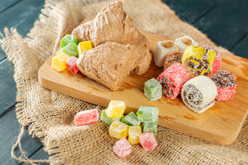 traditional eastern desserts on wooden background