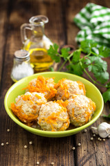 Chicken meatballs with rice braised in vegetables