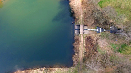 Top view of a wooden bridge at the Eutersee. The Eutersee is a little lake in south Hessia, Germany.
