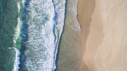 Aerial view of beach ocean waves and sand on Gold Coast beach © Bostock