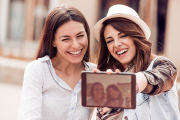 Friends making selfie