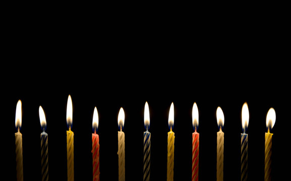 Lighting of birthday candle in the darkness