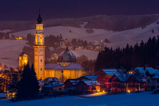 Town, Altopiano of Asiago, Province of Vicenza, Veneto, Italy. Cathedral of Saint Matteo at night.